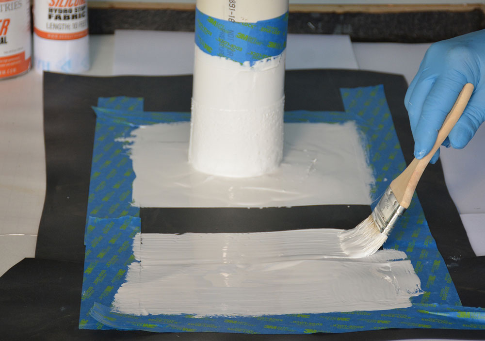 Apply a thick coat of Super Silicone Seal covering more than 2 inches either side of EPDM Rubber Seam